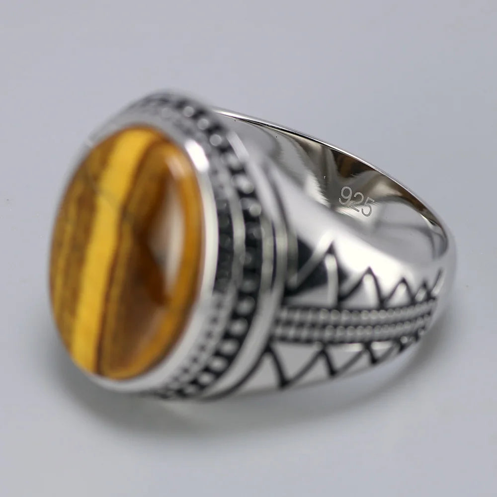 Bague homme argent sertie d'une pierre naturelle oeil de tigre ovale