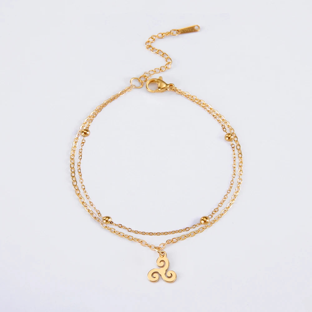 Bracelet acier inoxydable doré triple spirale celtique