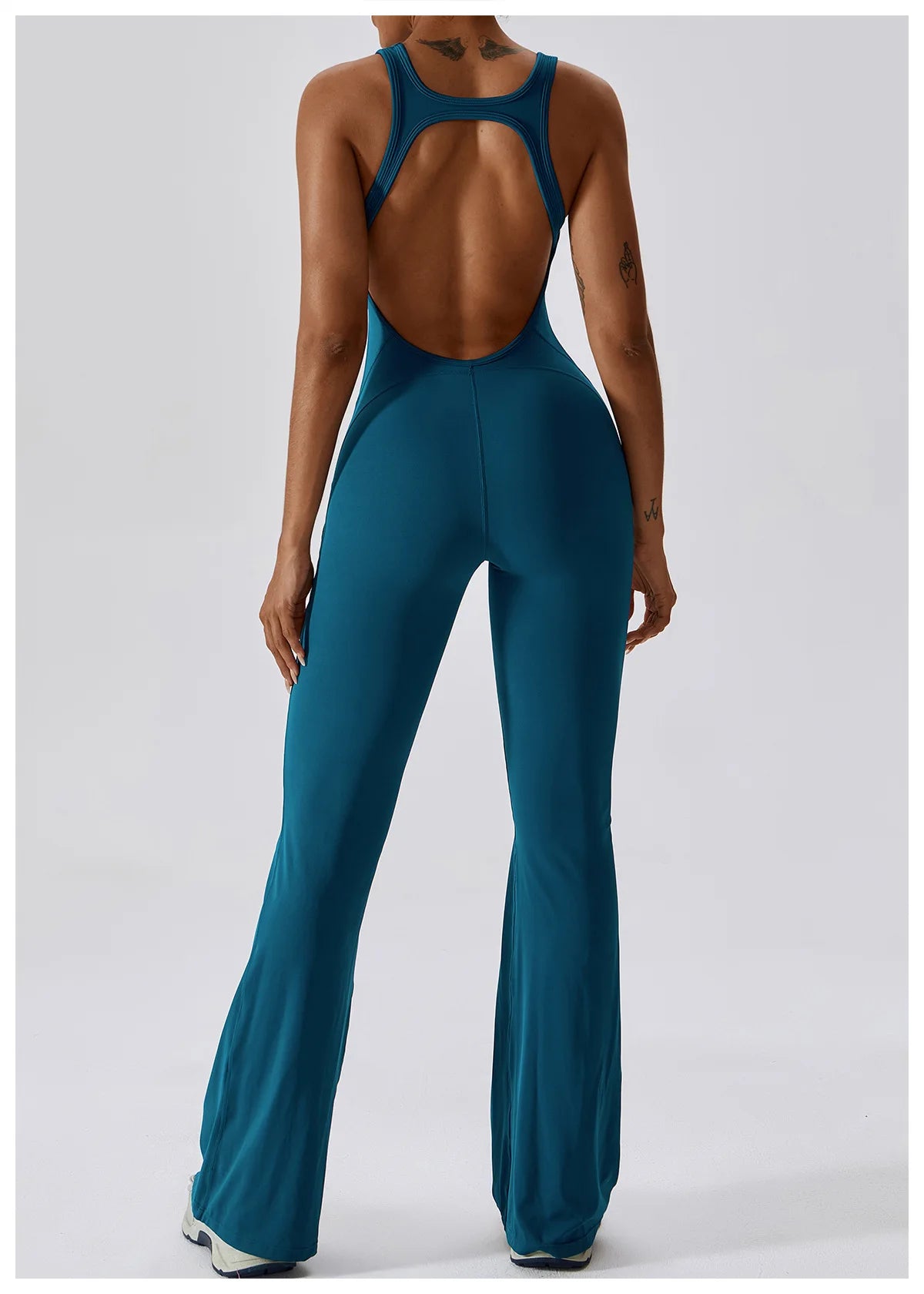 Combinaison femme bleu turquoise pour le sport body pour fitness yoga gym dos nu pantalon évasé
