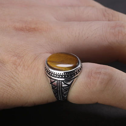 Bague homme argent sertie d'une pierre naturelle oeil de tigre ovale