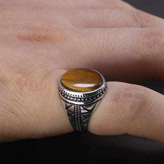 Bague homme argent sertie d'une pierre naturelle oeil de tigre ovale