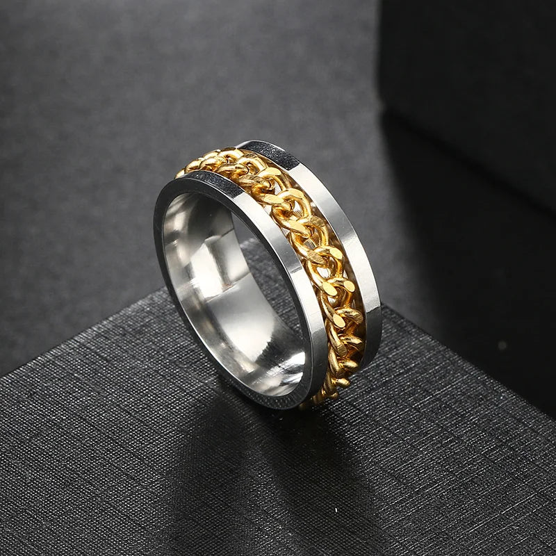 Bague homme argentée et dorée avec chaîne centrale rotative