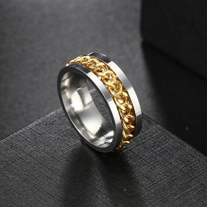 Bague homme argentée et dorée avec chaîne centrale rotative