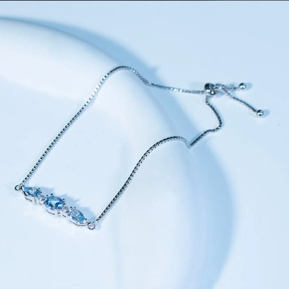 Bracelet femme argent topaze bleue zircons