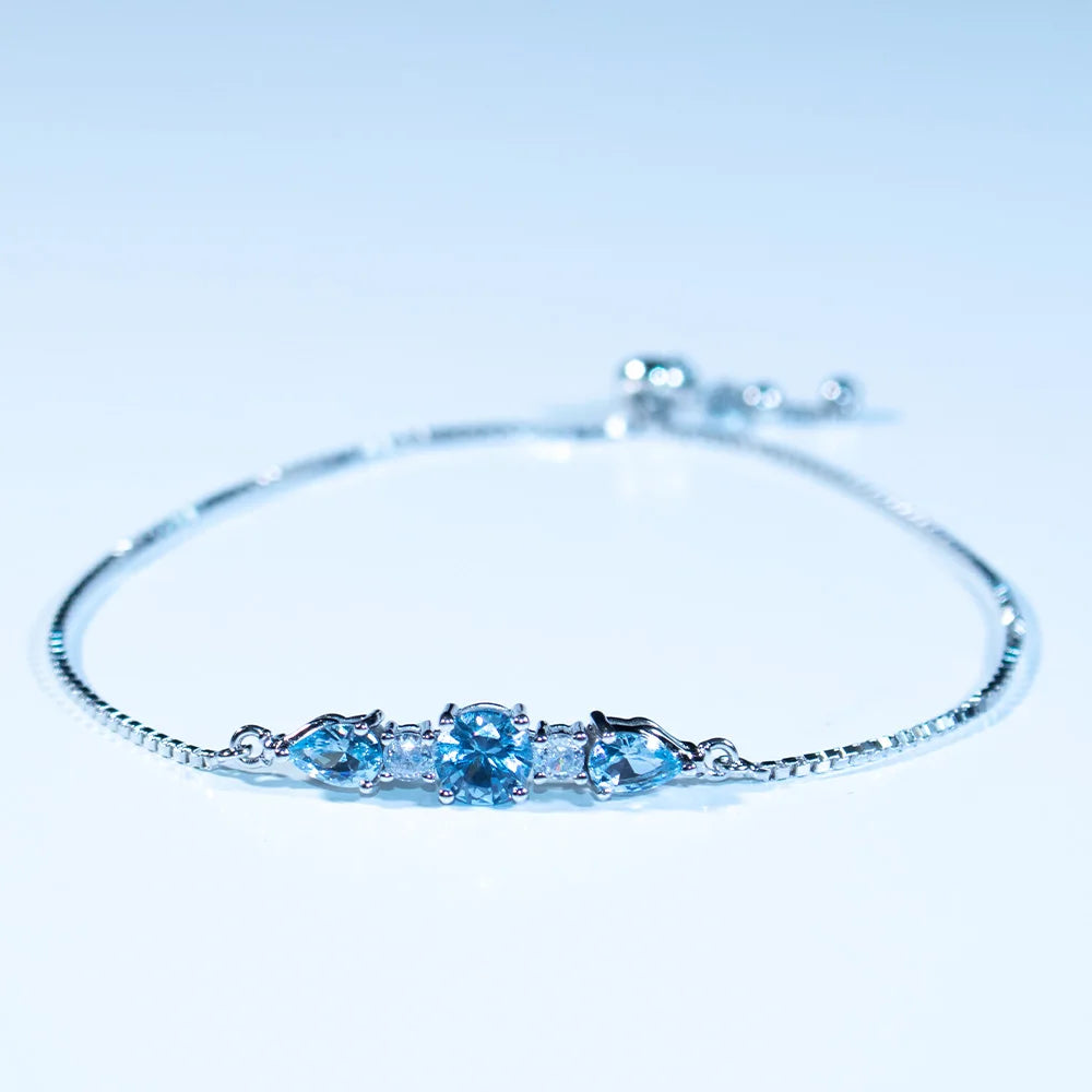 Bracelet femme argent topaze bleue zircons