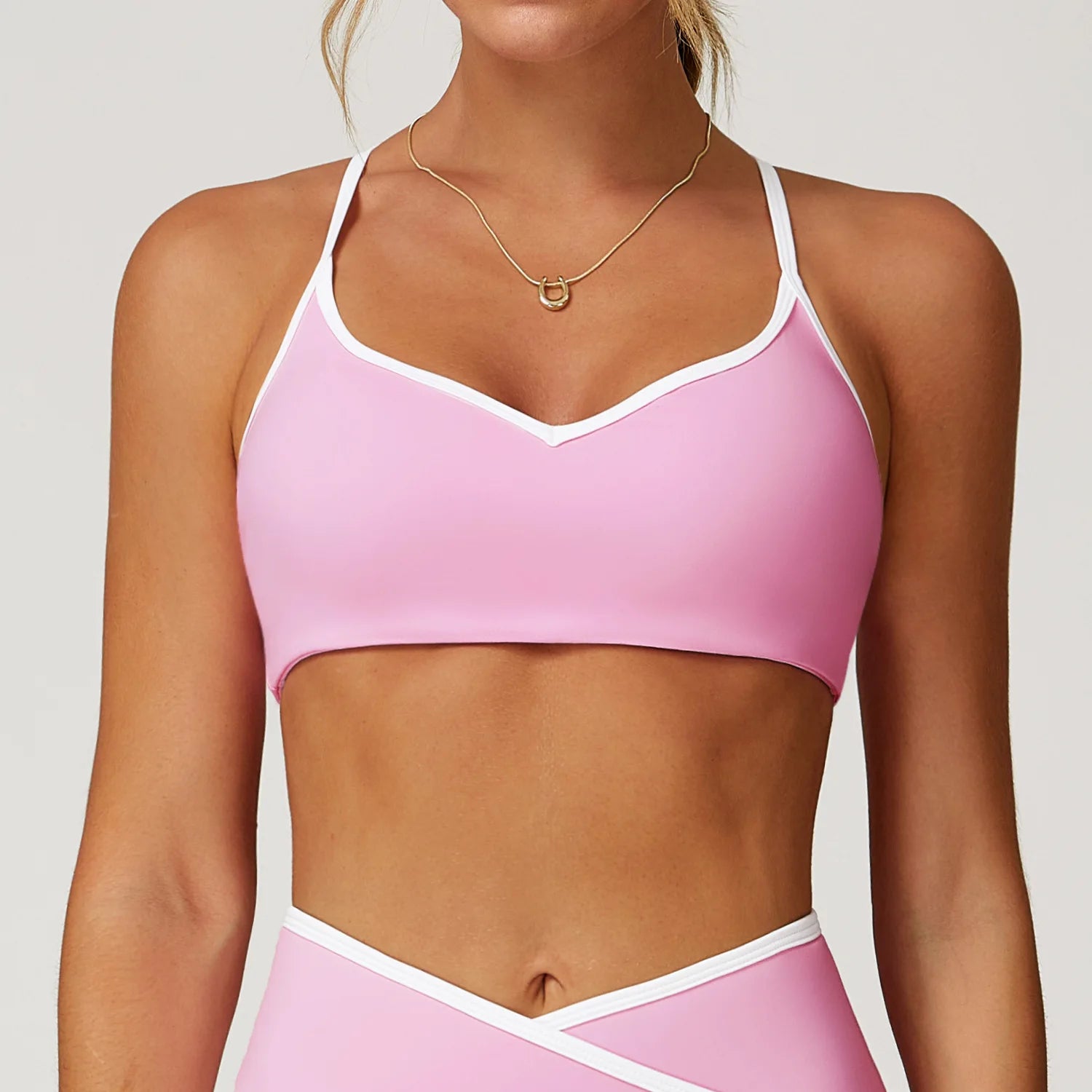Brassière femme rose liserés blancs vue de face