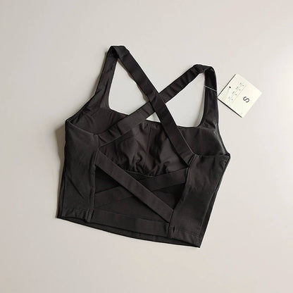 Brassière longue femme noire à plat, vue du dos avec bretelles et bandes croisées