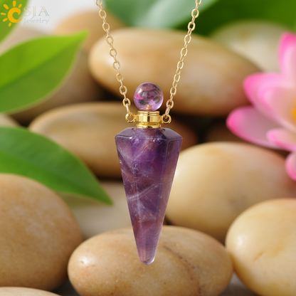 Collier huile essentielle pendentif améthyste sur fond zen naturel
