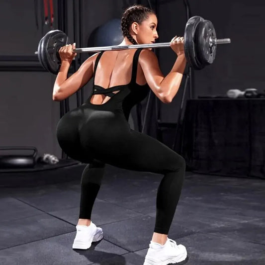 Combinaison femme fitness noire bretelles dos nu taille haute ceinture croisée