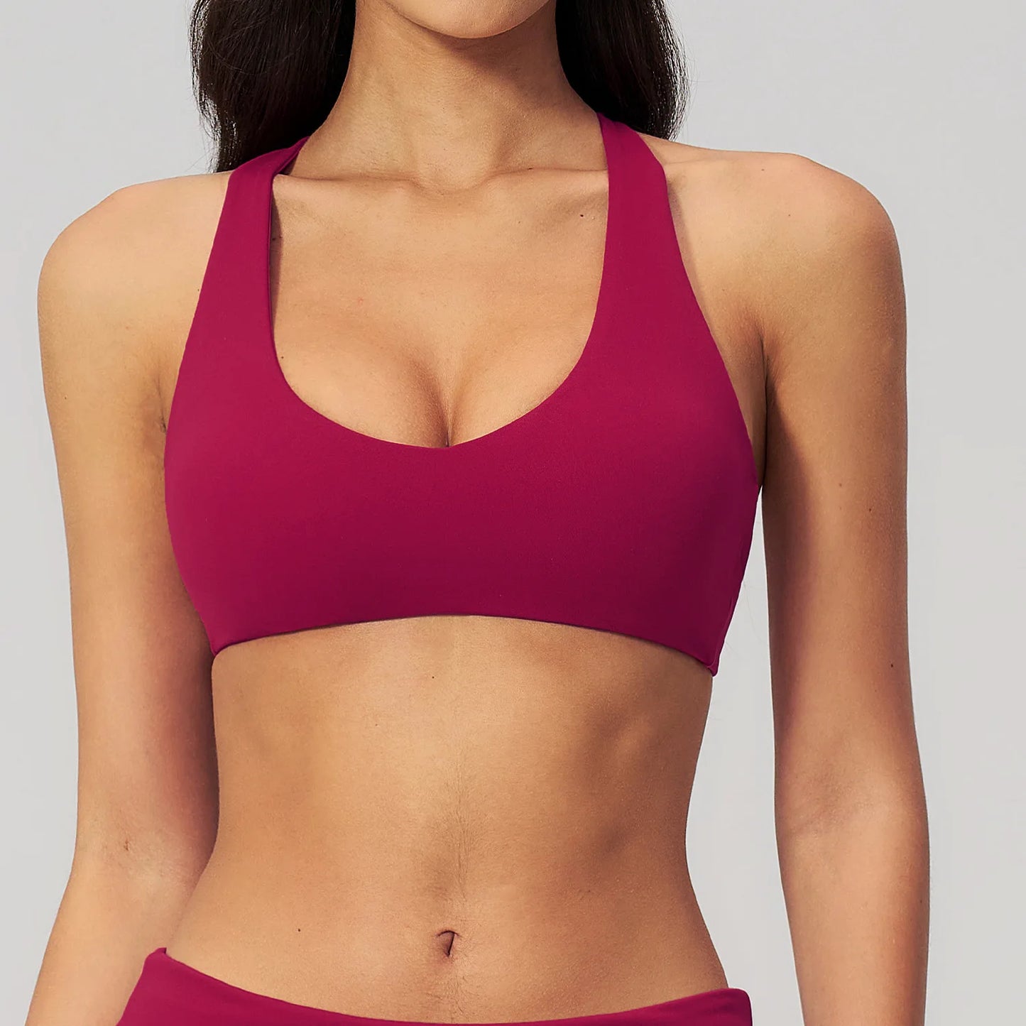 Soutien gorge bretelles croisées framboise fitness