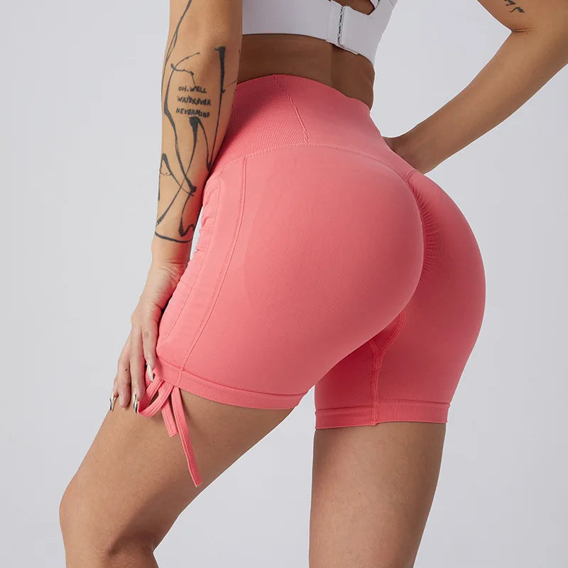 Yoga en short seamless rose – nœud élégant taille haute gainant