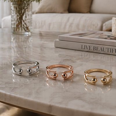 Bague anti stress ajustable argentée rose dorée perles mobiles