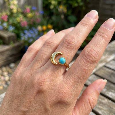Bague femme dorée croissant de lune pierre bleue 