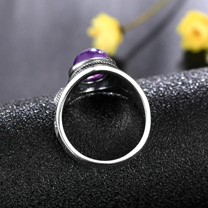 Bague homme améthyste sur support anthracite avec fleurs jaunes - ambiance zen