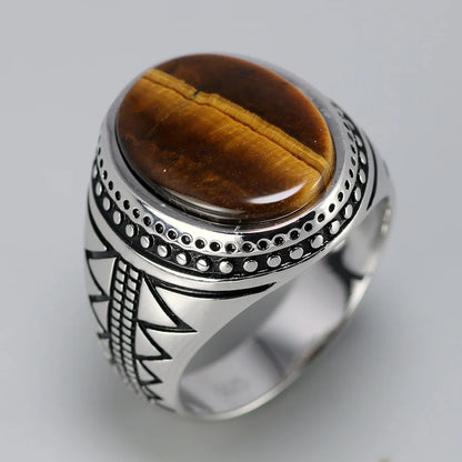 Bague homme argent sertie d'une pierre naturelle oeil de tigre ovale