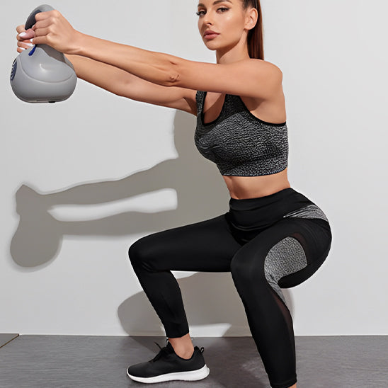 brassière-femme-fitness-grise-squat