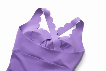 Détail bretelles croisées dos combi yoga femme ajustable
