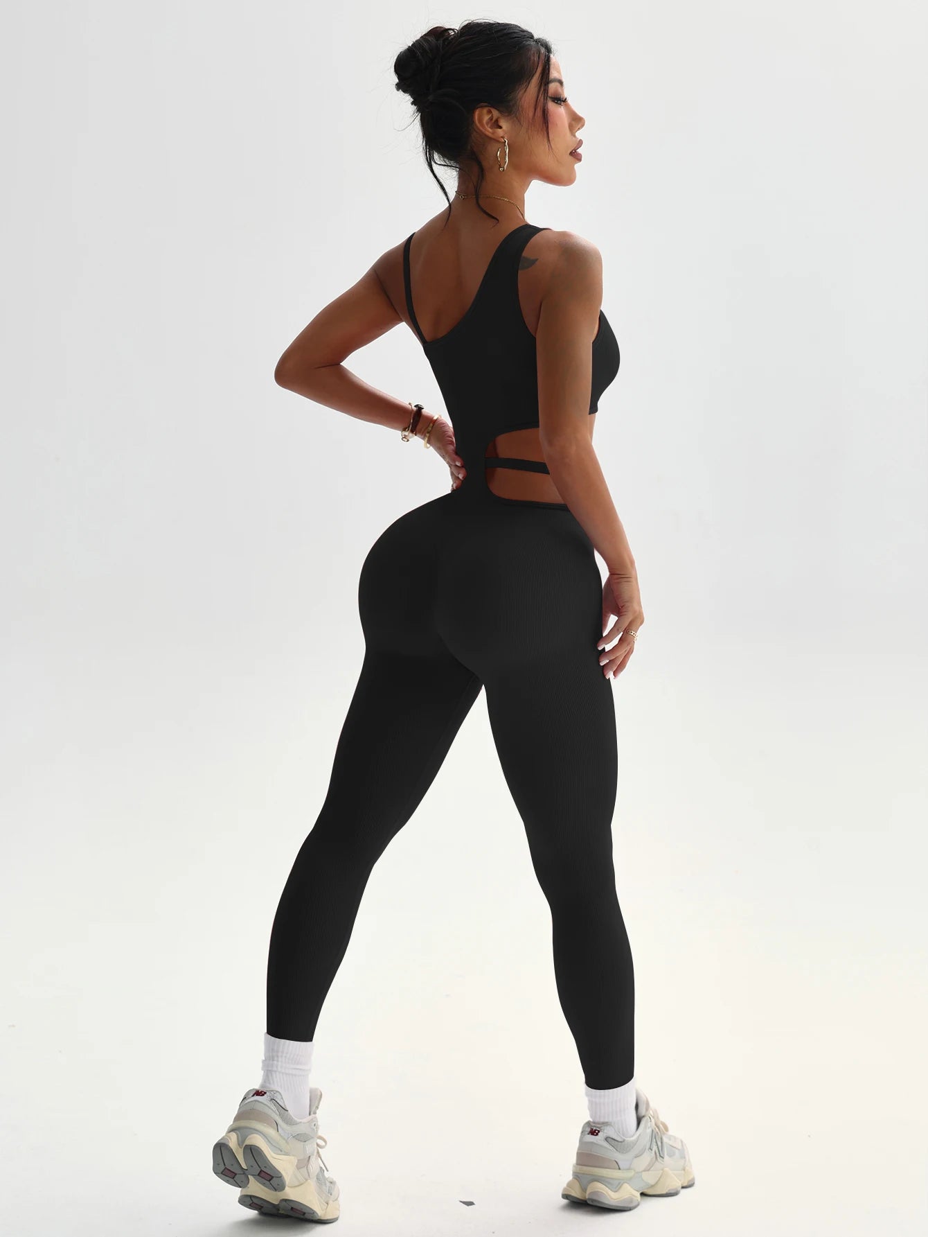 Combinaison pilates femme noire asymétrique – découpe taille effet gainant