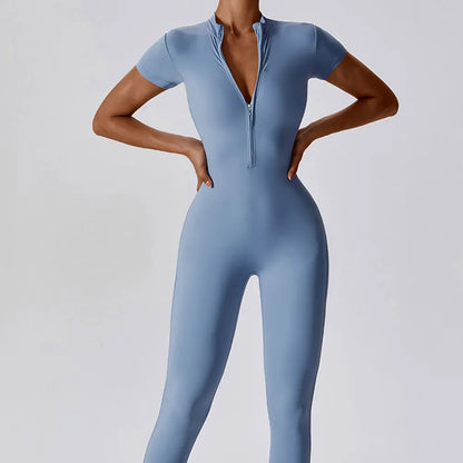 Combinaison fitness pilates respirante tissu extensible bleue zippée