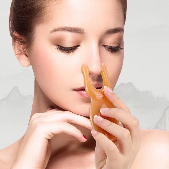 gua sha anti ride visage femme