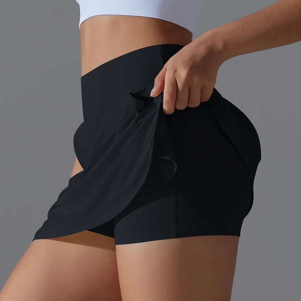 Jupe short noir femme – tissu respirant anti-UV yoga & tennis