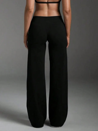 LEGGING SPORT EVASE femme vu de derrière – silhouette allongée