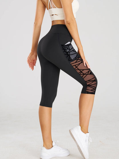 Pantalon yoga noir legging court femme - poche latérale