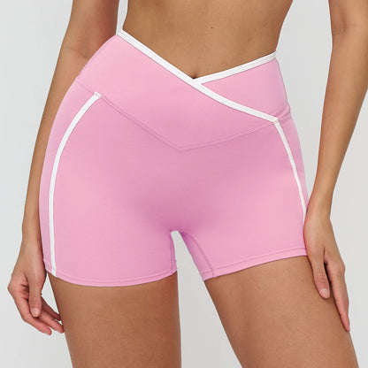 Short yoga rose femme coutures blanches sport