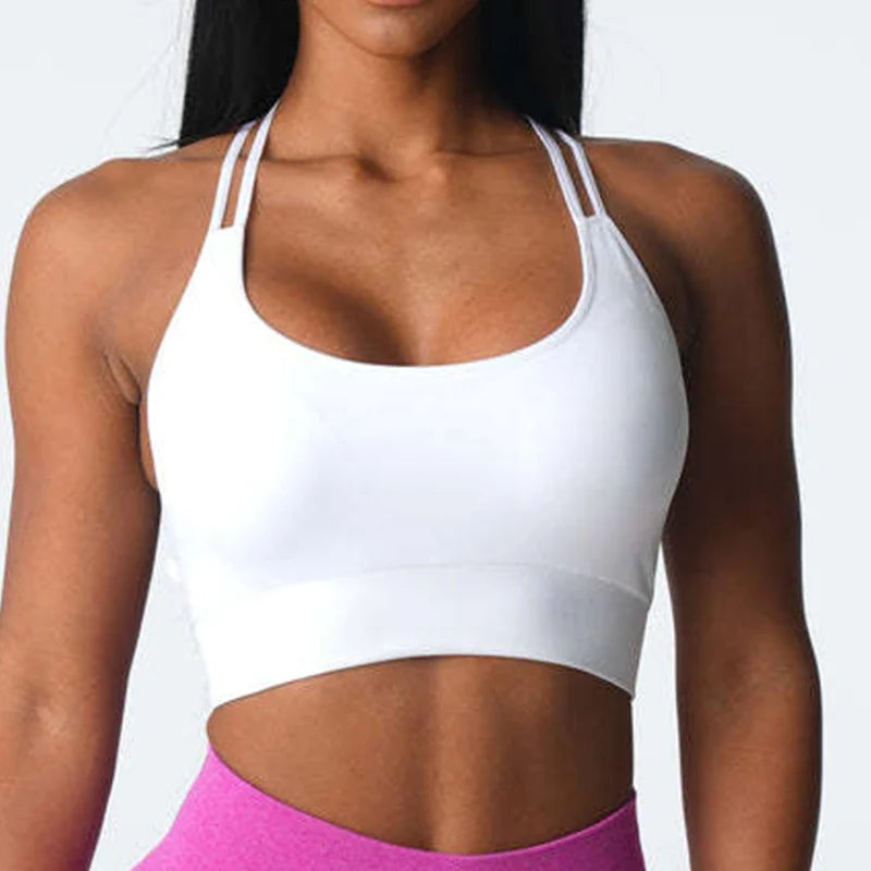 Soutien gorge bretelles croisées sport femme blanc legging rose fuchsia 
